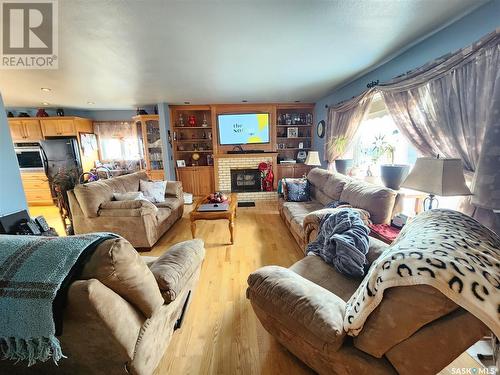 109 Taylor Street, Ogema, SK - Indoor Photo Showing Living Room With Fireplace