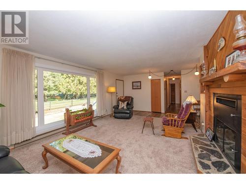 225 Trinity Valley Road, Lumby, BC - Indoor Photo Showing Living Room With Fireplace