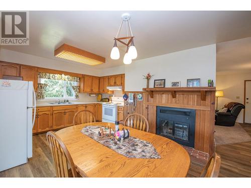 225 Trinity Valley Road, Lumby, BC - Indoor Photo Showing Other Room With Fireplace