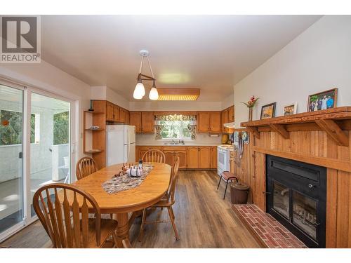 225 Trinity Valley Road, Lumby, BC - Indoor Photo Showing Dining Room With Fireplace
