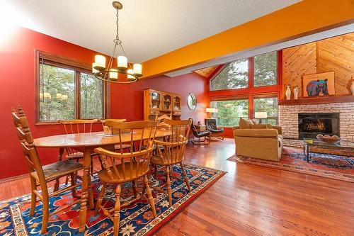 5114 Wilder Loop Road, Fairmont Hot Springs, BC - Indoor Photo Showing Dining Room With Fireplace