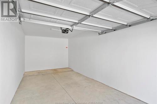 728 Brownstone Unit# 303, Lakeshore, ON - Indoor Photo Showing Garage