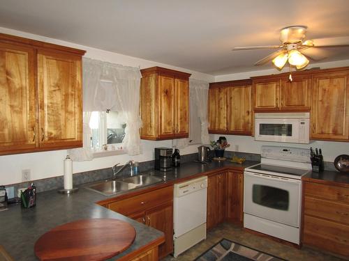 1 - 6780 21St Street, Grand Forks, BC - Indoor Photo Showing Kitchen With Double Sink
