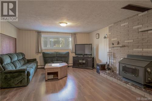 27 Chapel Road, Rothesay, NB - Indoor Photo Showing Living Room With Fireplace