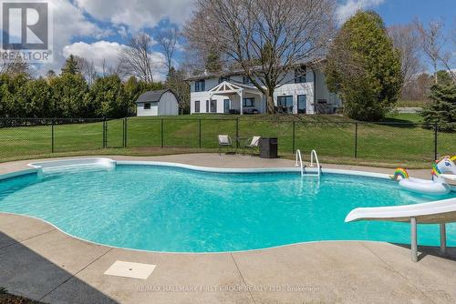 9469 Cedar Creek Trail, Hamilton Township, ON - Outdoor With In Ground Pool With Backyard