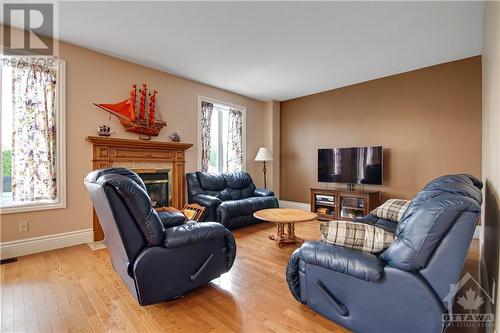 2136 Valenceville Crescent, Ottawa, ON - Indoor Photo Showing Living Room With Fireplace