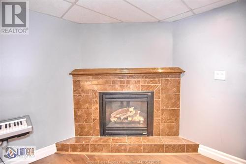 3070 Meadowbrook Lane Unit# 1, Windsor, ON - Indoor Photo Showing Living Room With Fireplace
