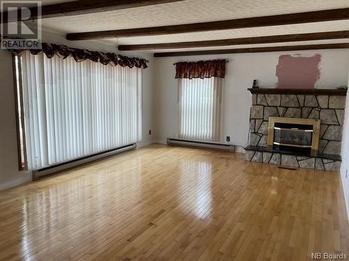5 Birch Street, Florenceville-Bristol, NB - Indoor Photo Showing Living Room With Fireplace