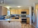 344-352 Seyforth Drive, Vanderhoof, BC  - Indoor Photo Showing Kitchen With Double Sink 