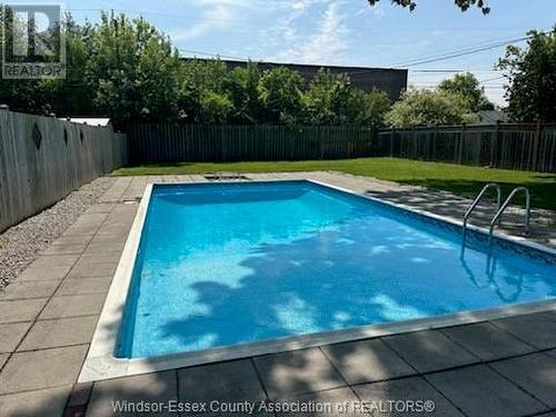 3217 Woodlawn Avenue, Windsor, ON - Outdoor With In Ground Pool With Backyard