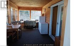 3 season porch off of kitchen - 
