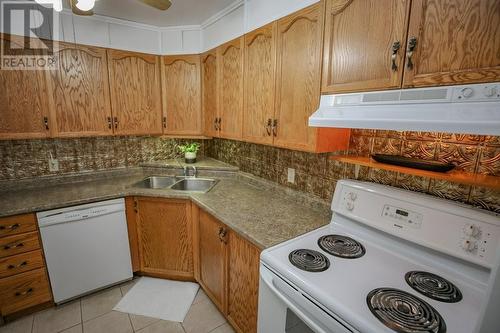 820 Laurier Boulevard Unit#210, Brockville, ON - Indoor Photo Showing Kitchen With Double Sink