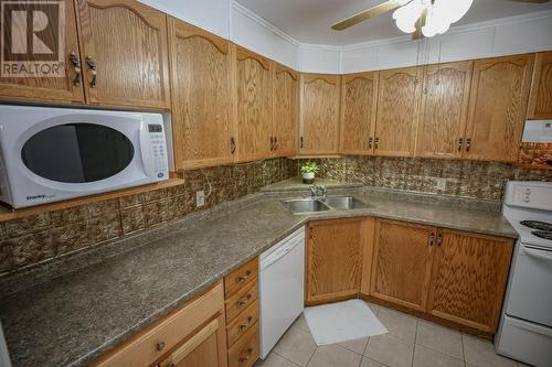 820 Laurier Boulevard Unit#210, Brockville, ON - Indoor Photo Showing Kitchen With Double Sink