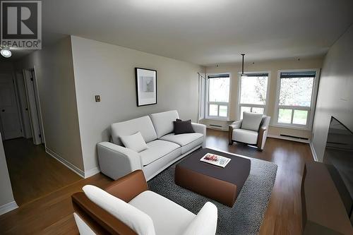 Photo is virtually staged - 820 Laurier Boulevard Unit#210, Brockville, ON - Indoor Photo Showing Living Room