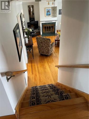 Stairway to upper level - 1118 Fifth Street E, Cornwall, ON - Indoor With Fireplace
