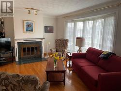 Living room - bay window & hardwood floors - 