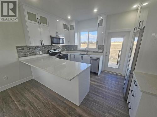 A 8323 79A Street, Fort St. John, BC - Indoor Photo Showing Kitchen With Upgraded Kitchen