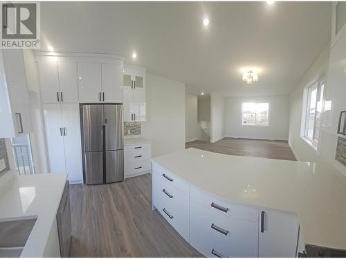 A 8323 79A Street, Fort St. John, BC - Indoor Photo Showing Kitchen With Upgraded Kitchen