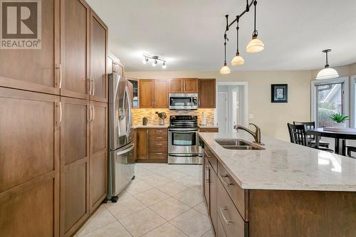 932 Monashee Place, Kelowna, BC - Indoor Photo Showing Kitchen With Double Sink