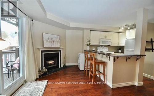 27 Turner Drive, Huntsville, ON - Indoor Photo Showing Kitchen With Fireplace