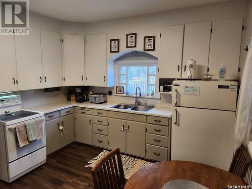223 Coulthard Street, Conquest, SK - Indoor Photo Showing Kitchen With Double Sink