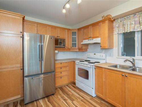 207-5660 Edgewater Lane, Nanaimo, BC - Indoor Photo Showing Kitchen With Double Sink