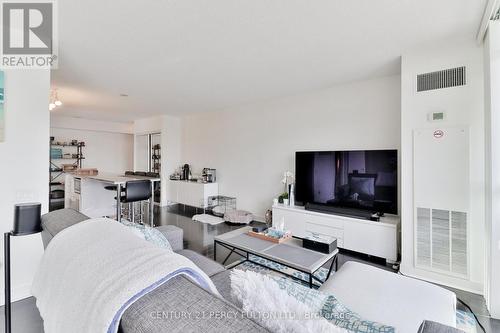 905 - 33 Singer Court, Toronto, ON - Indoor Photo Showing Living Room