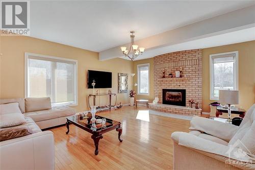 113 Huntley Manor Drive, Carp, ON - Indoor Photo Showing Living Room With Fireplace