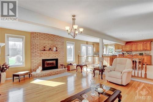 113 Huntley Manor Drive, Carp, ON - Indoor Photo Showing Living Room With Fireplace