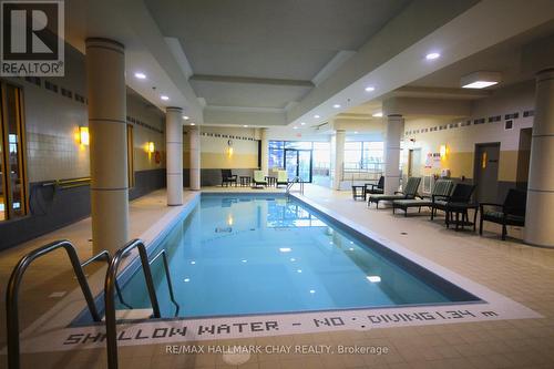 #511 -37 Ellen St, Barrie, ON - Indoor Photo Showing Other Room With In Ground Pool