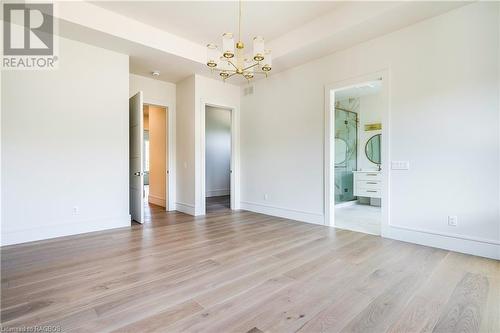 Master Suite with walk in closet - 147 Blue Jay Crescent, Grey Highlands, ON - Indoor Photo Showing Other Room