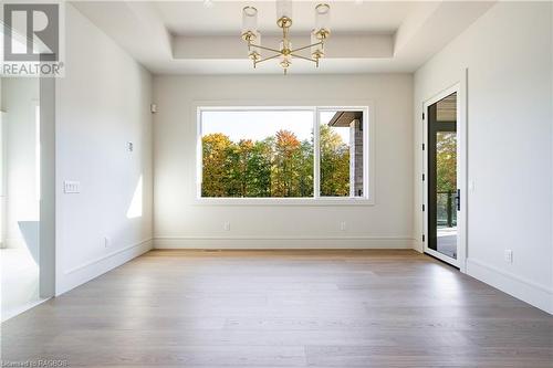 Master Suite with walk out to covered porch - 147 Blue Jay Crescent, Grey Highlands, ON - Indoor Photo Showing Other Room