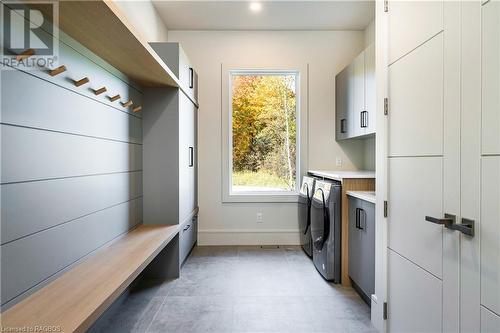 Mudroom and Laundry with custom storage - 147 Blue Jay Crescent, Grey Highlands, ON - Indoor Photo Showing Laundry Room