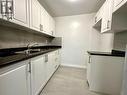 302 - 363 Lakeshore Road E, Mississauga, ON  - Indoor Photo Showing Kitchen With Double Sink 