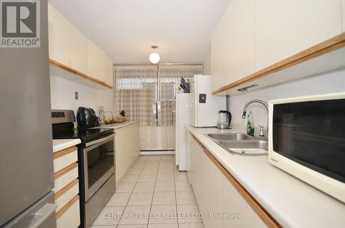 1407 - 25 Kensington Road, Brampton, ON - Indoor Photo Showing Kitchen With Double Sink