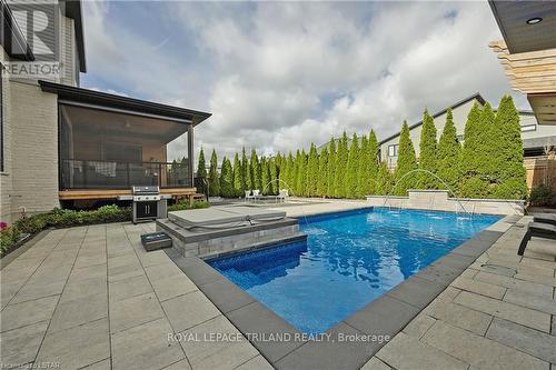 6584 French Ave, London, ON - Outdoor With In Ground Pool With Deck Patio Veranda