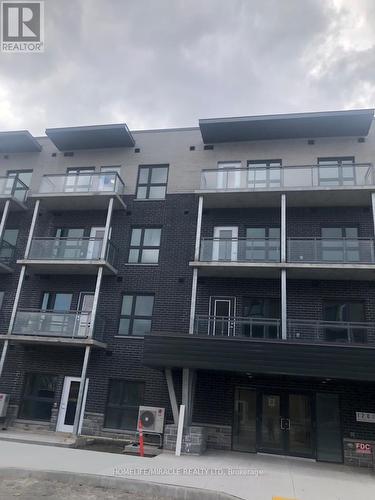 102 - 1201 Lackner Place, Kitchener, ON - Outdoor With Balcony With Facade