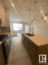 #Main 8070 Kiriak Li Sw, Edmonton, AB  - Indoor Photo Showing Kitchen With Double Sink 