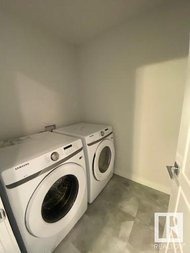 #Main 8070 Kiriak Li Sw, Edmonton, AB - Indoor Photo Showing Laundry Room