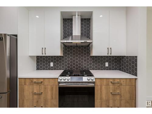 #Main 8082 Kiriak Li Sw, Edmonton, AB - Indoor Photo Showing Kitchen With Upgraded Kitchen
