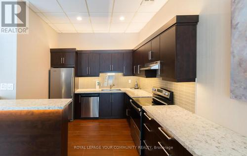 #306 -75 Wynford Heights Cres, Toronto, ON - Indoor Photo Showing Kitchen With Upgraded Kitchen