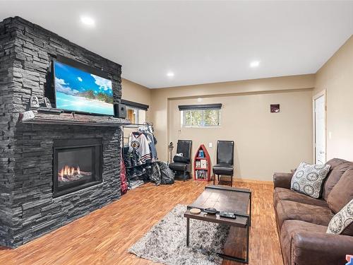 437 Cedar Street, Revelstoke, BC - Indoor Photo Showing Living Room With Fireplace