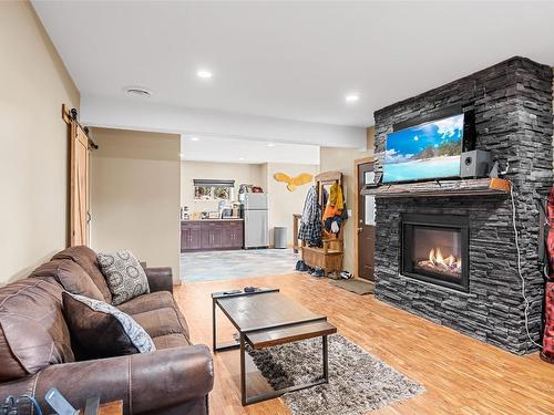 437 Cedar Street, Revelstoke, BC - Indoor Photo Showing Living Room With Fireplace