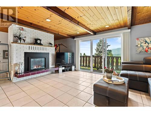 3420 1St Avenue Ne, Salmon Arm, BC - Indoor Photo Showing Living Room With Fireplace