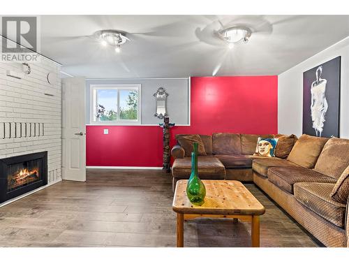 3420 1St Avenue Ne, Salmon Arm, BC - Indoor Photo Showing Living Room With Fireplace