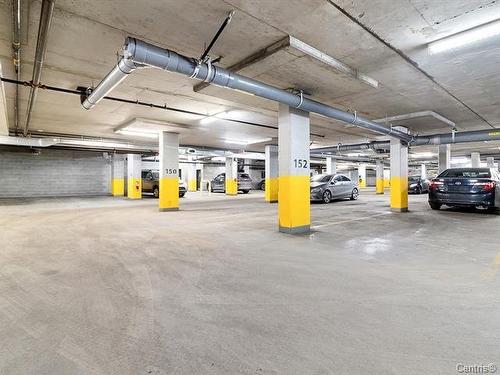 Stationnement - 412-10150 Place De L'Acadie, Montréal (Ahuntsic-Cartierville), QC - Indoor Photo Showing Garage