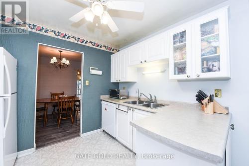 #50 -2701 Aquitaine Ave, Mississauga, ON - Indoor Photo Showing Kitchen With Double Sink