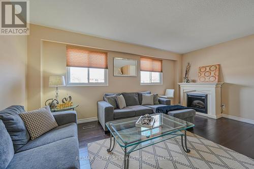 66 Carisbrook Crt, Brampton, ON - Indoor Photo Showing Living Room With Fireplace