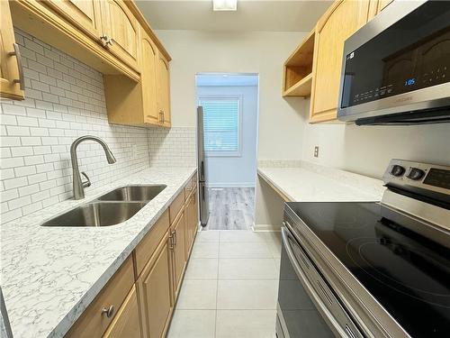 657 Fennell Avenue E|Unit #2, Hamilton, ON - Indoor Photo Showing Kitchen With Double Sink With Upgraded Kitchen