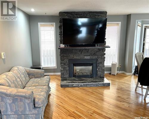 2550 Cardinal Crescent, North Battleford, SK - Indoor Photo Showing Living Room With Fireplace